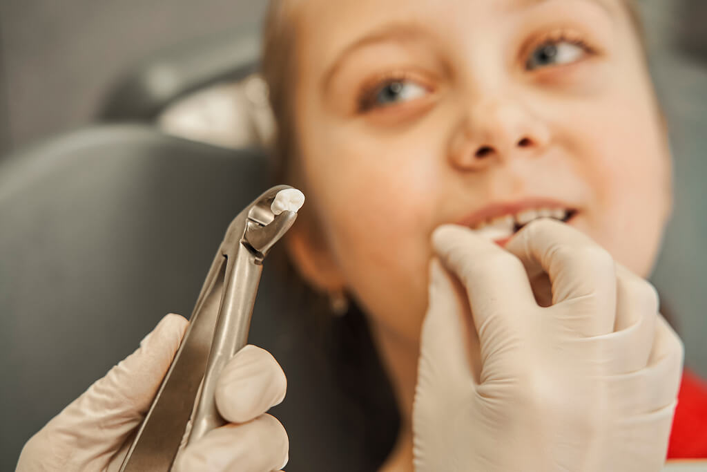 How Soon Can Your Child Go Back to School After a Tooth Extraction?